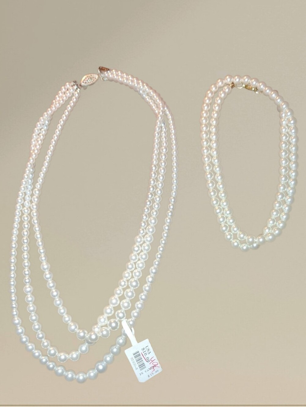 two White faux pearl necklace with gold clasp  one with silver vintage